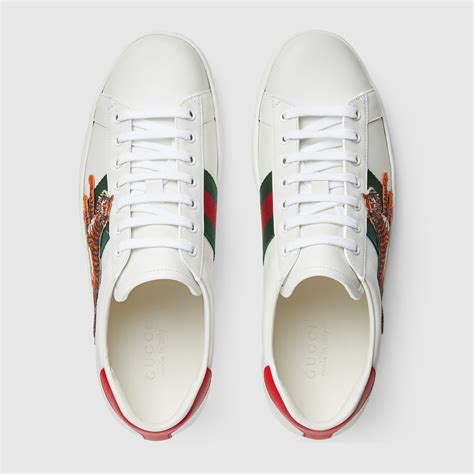 gucci ace stripe metallic leather sneakers|Gucci ace tiger sneakers.